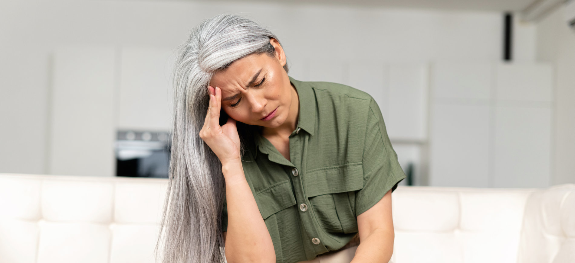 a woman having a headache