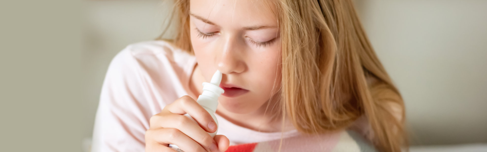 girl with nasal spray